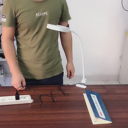 Magnifying glass lamp with LED lighting and table clamp